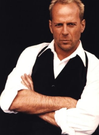 b) Bruce Willis or Nicolas Cage